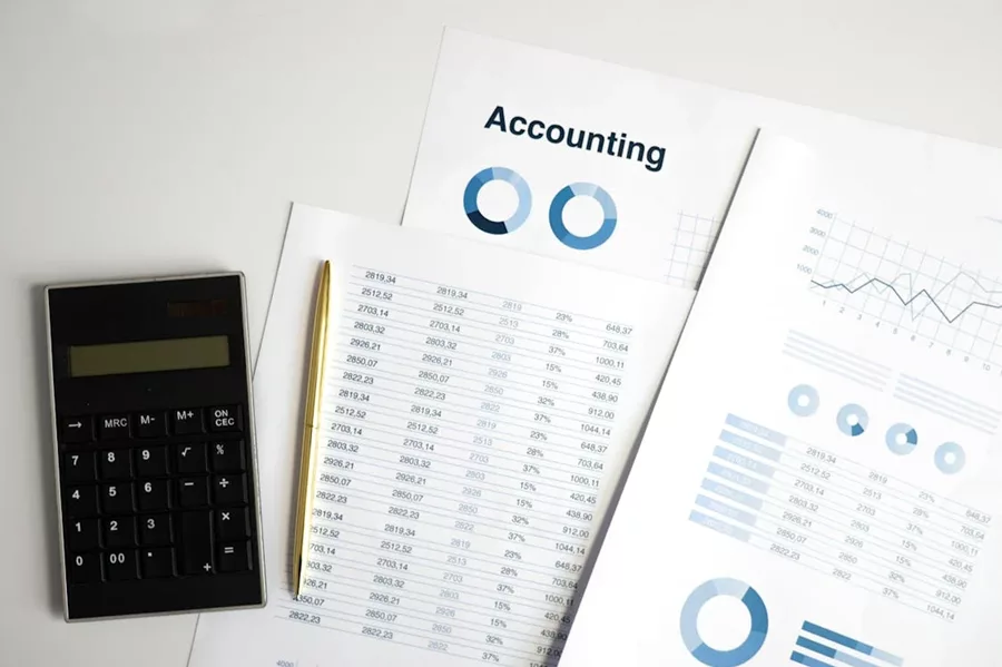 Calculator and accounting documents, charts, and tables; essential for documents required for AFSL.